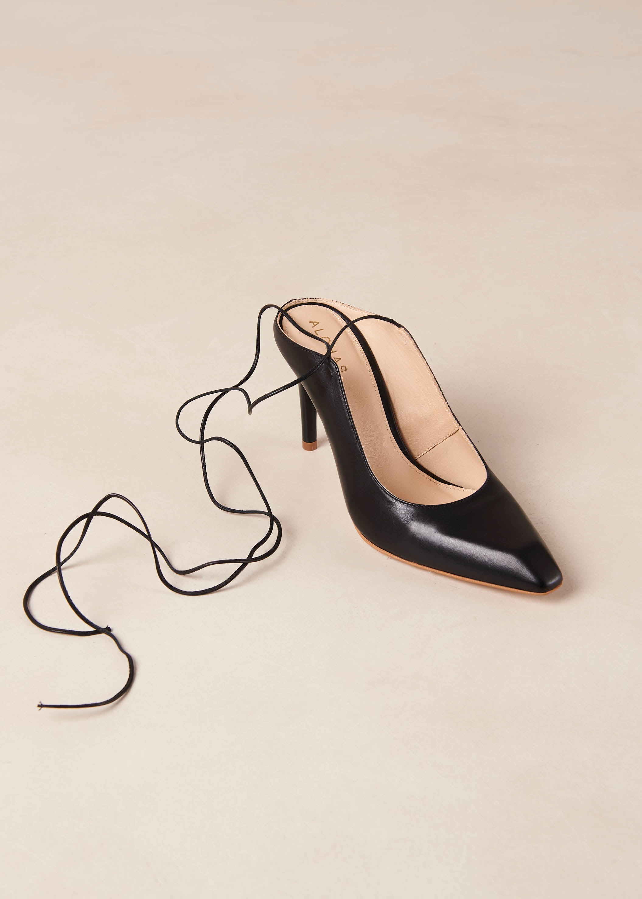 Avery Black Leather Pumps